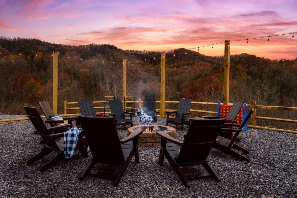 Fire Pit in backyard with picnic tables & views