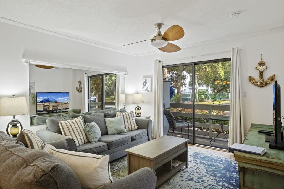 Spacious living room to wind down from your long day at the beach