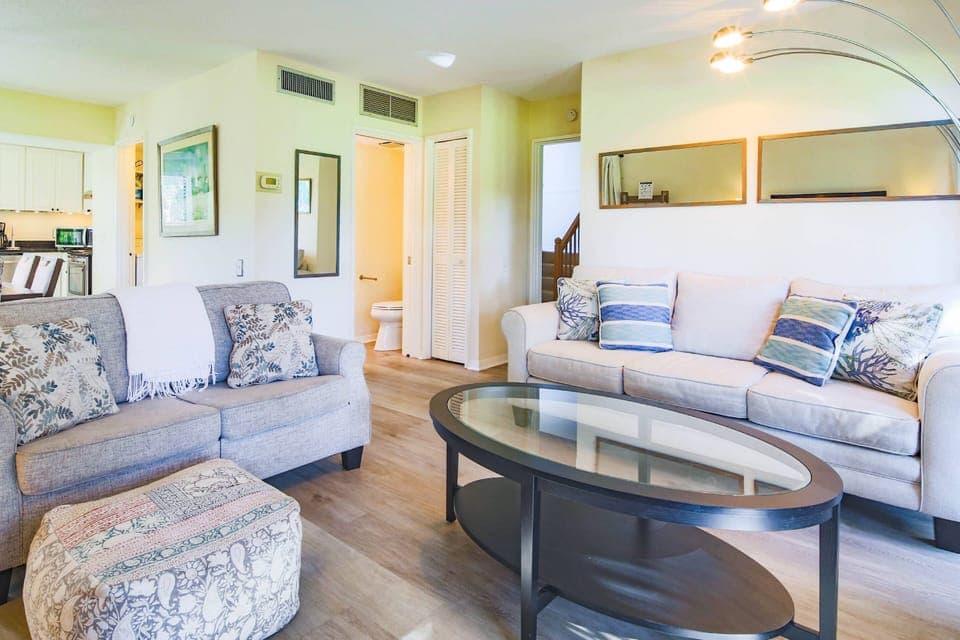When you enter the front door, you will find the stairs, a bathroom, dining area and living room.