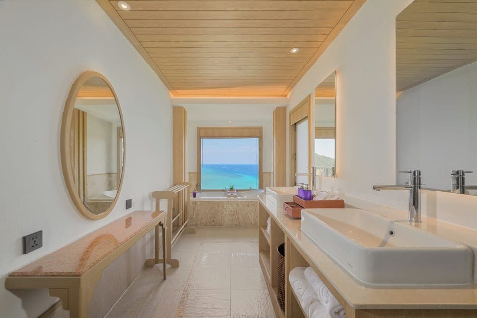 Separate tub and shower, rainfall showerhead, free toiletries