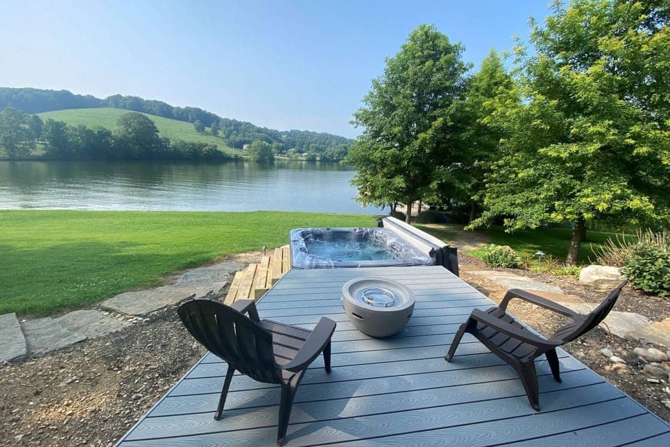 Grab a seat in the hot tub or on the deck and enjoy this unapparelled view of Watts Bar!