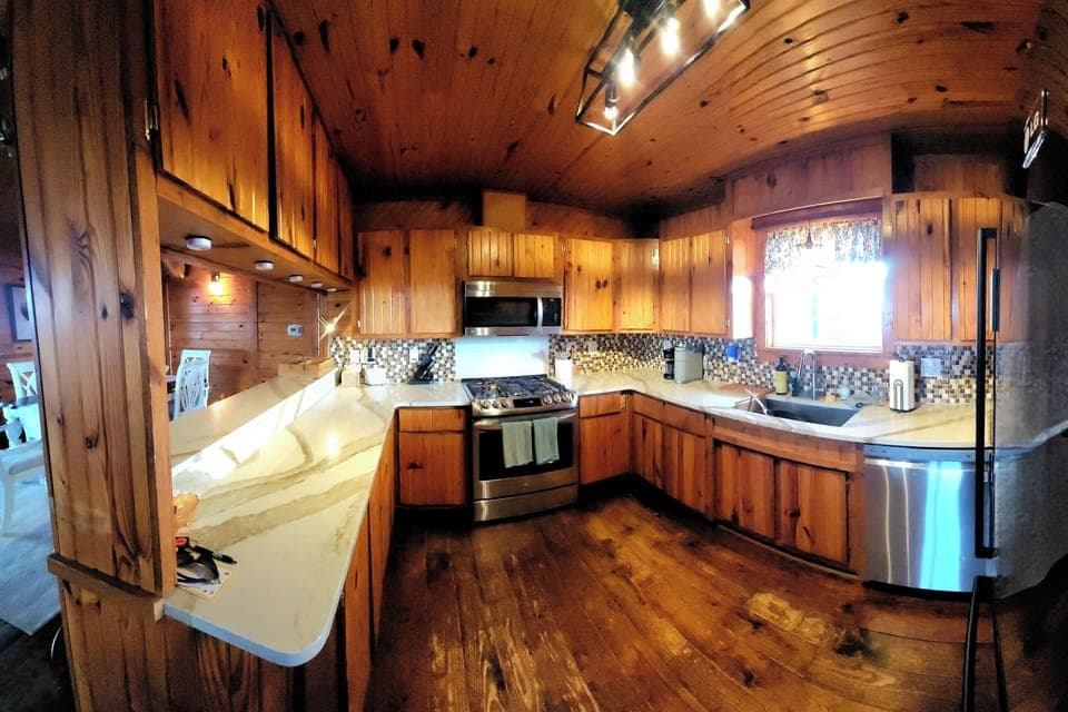 Large kitchen with plenty of counter and cabinet space.  Fully stocked!
