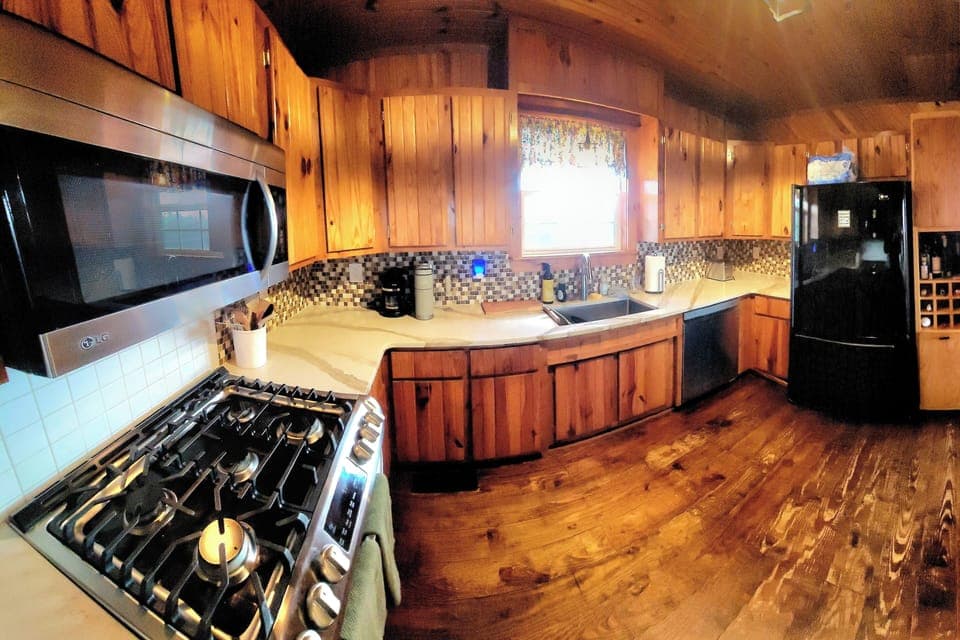Large kitchen with plenty of counter and cabinet space.  Fully stocked!