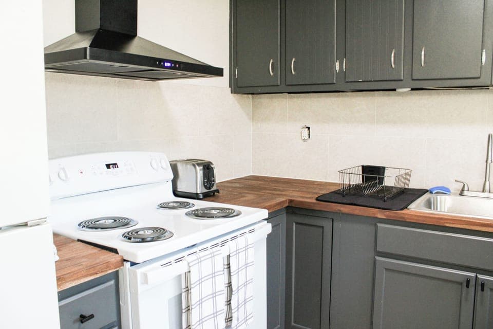 Modern appliances fully equipped kitchen.
