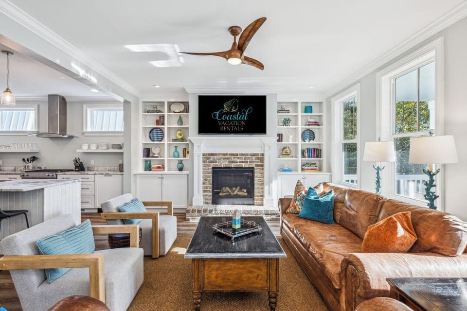 Living room featuring a tv and plenty of seating.