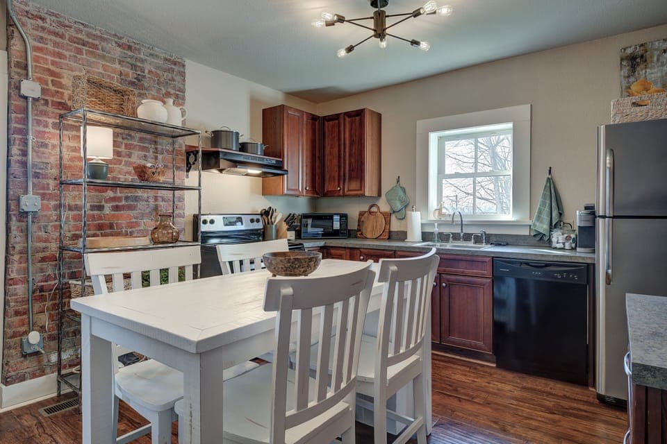 Fully furnished kitchen with appliances and dinner service for 12