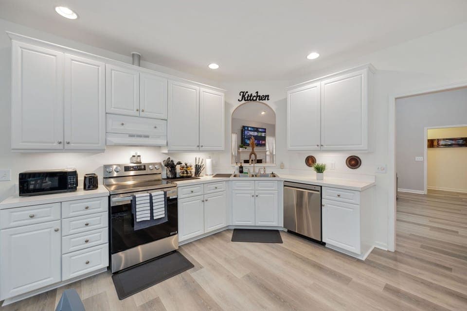 The fully stocked kitchen is perfect for cooking meals.