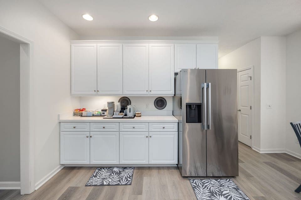 Large stainless steel refrigerator with ice maker/ water dispenser.