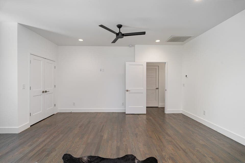 The 2nd bedroom, located on the 3rd floor, is furnished with two full beds, offering a cozy retreat.