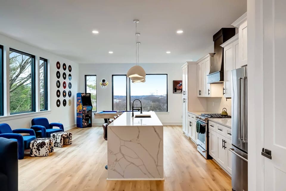 Experience this stylish Nashville vacation home featuring a spacious kitchen, game room, and stunning skyline views—ideal for large groups seeking relaxation and memorable gatherings!