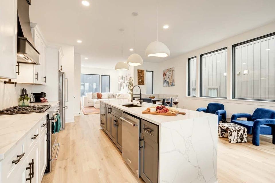 Experience this elegant Nashville kitchen, perfect for family reunions or bachelorette parties! With a spacious layout for gourmet meals and city views, it's an unforgettable retreat for large groups in Music City.