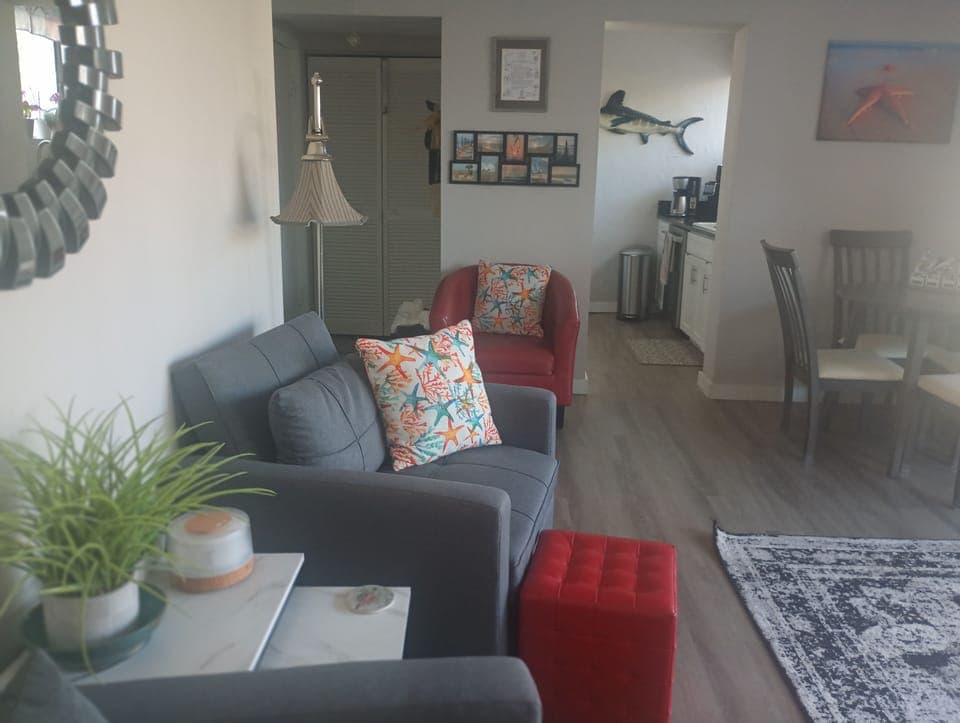 Open floor plan. LPV flooring easy to keep clean, Roberto (friendly robot).