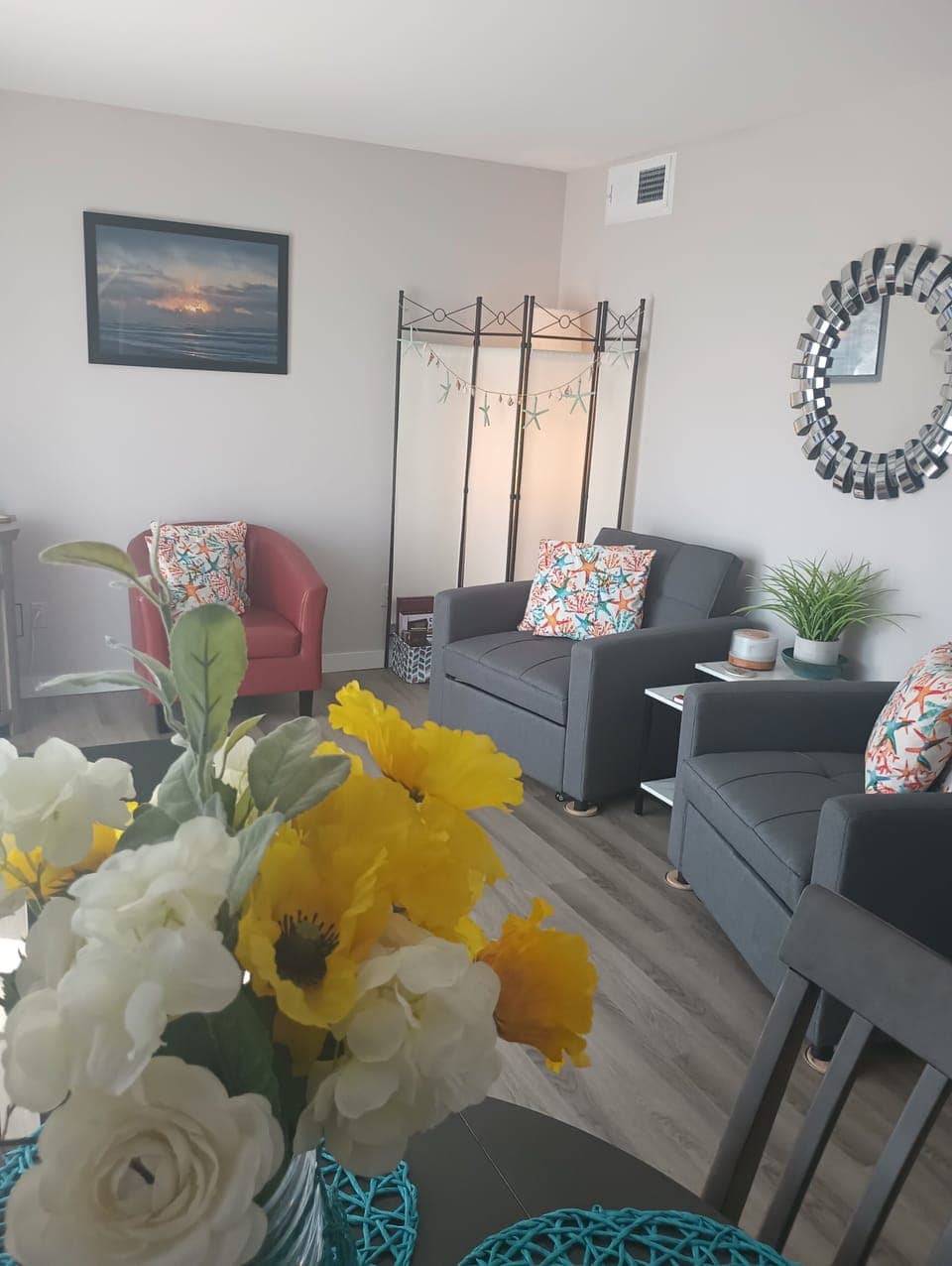 Open, light bright and airy. Chairs recline and convert to twin beds. 