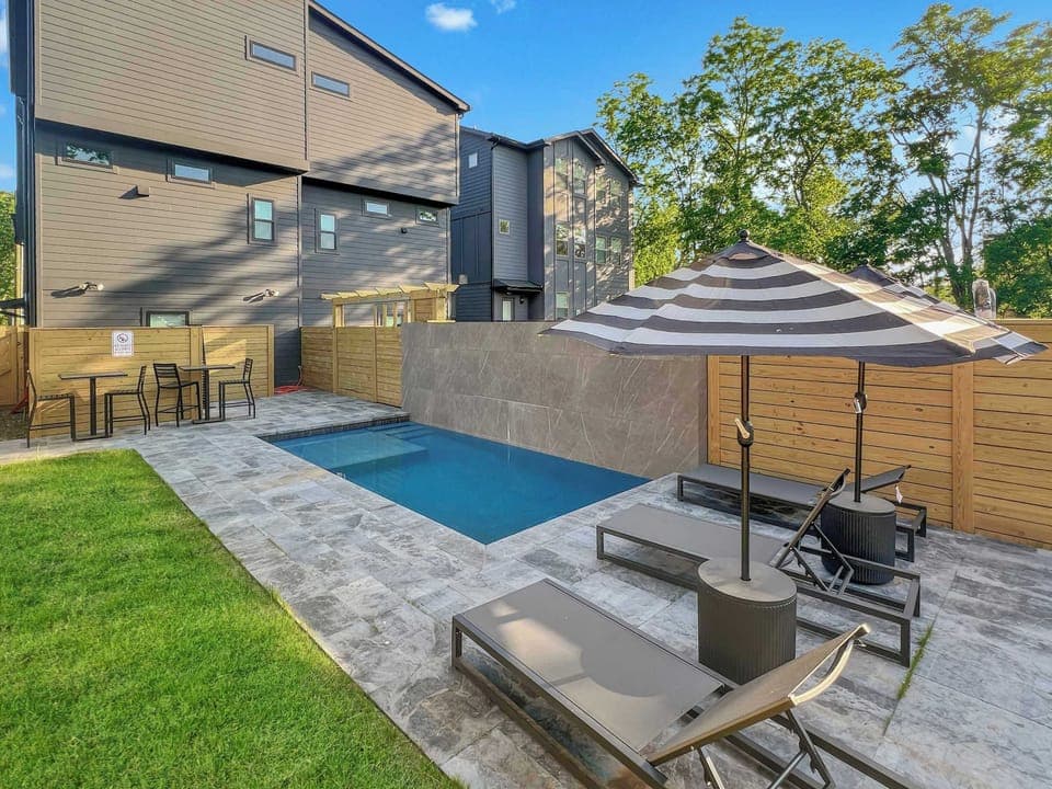 Backyard: Soak up the sun and enjoy a dip in our inviting shared pool area. Backyard and pool is shared with guests staying in the first floor.