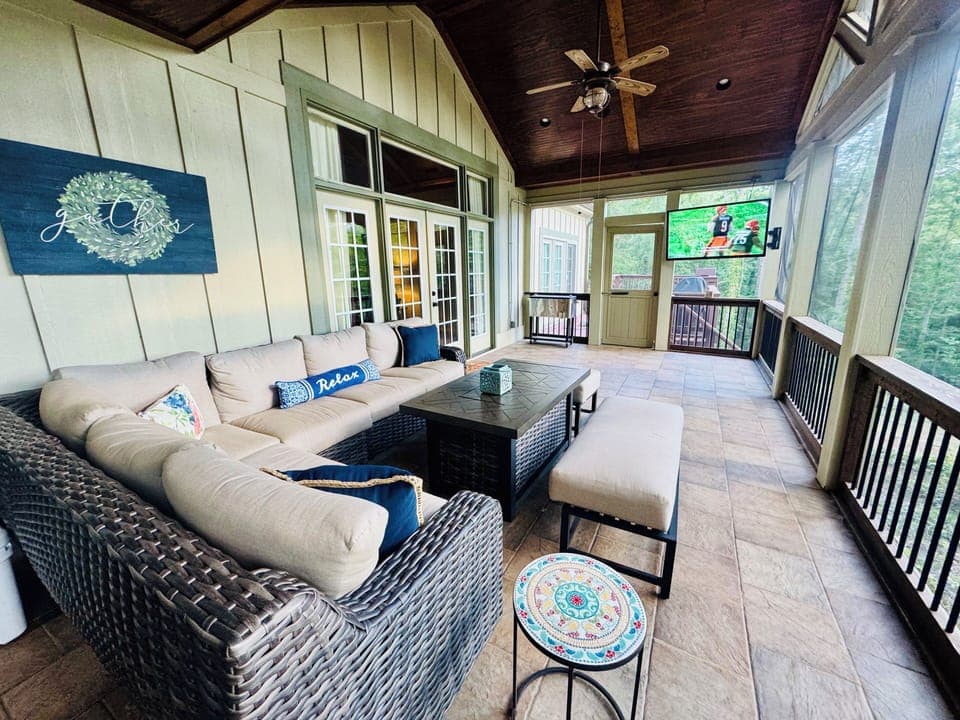 Expansive Screen Porch w/ Sectional Sofa Fire Table, Smart Outdoor TV