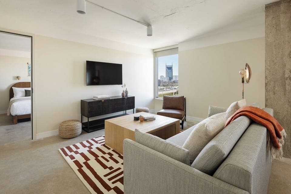 Stretch out on the sofa and enjoy city views.