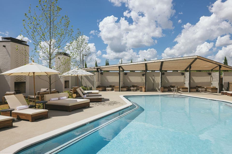 Dive into sparkling water and stretch out on plush loungers.