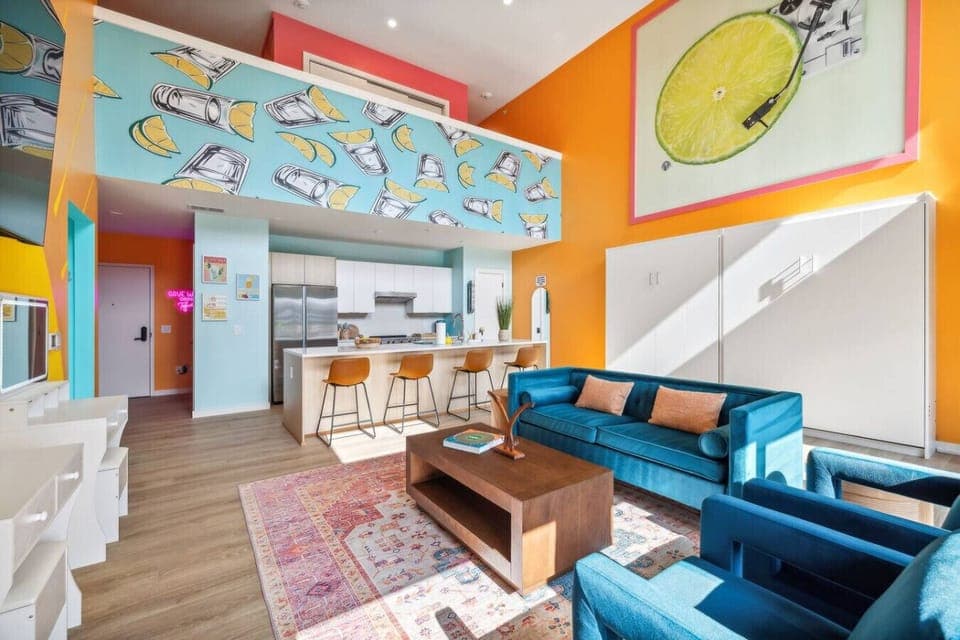 Tequila Sunrise unit: Open concept living room / kitchen / murphy beds