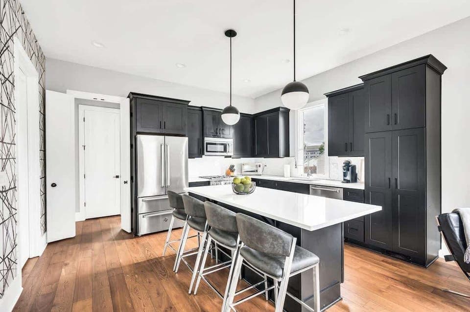 Enjoy your meals in this chic dining area, where contemporary design meets functionality. Whether you're preparing a home-cooked meal or ordering takeout, this space is perfect for dining in style.

