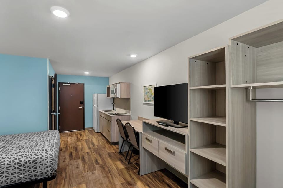 Suite, 2 Queen Beds, Non Smoking | Desk, laptop workspace, blackout drapes, free WiFi