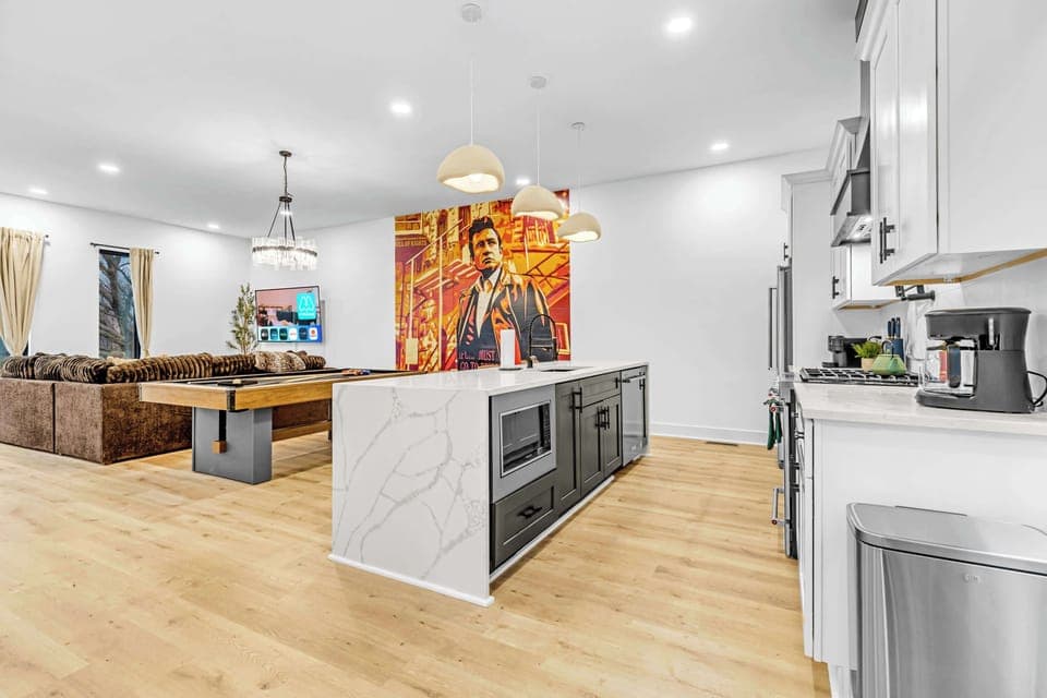 Explore this chic Nashville oasis, perfect for bachelorette parties and family reunions. Enjoy stylish design, spacious comfort, and a game room for unforgettable memories. Gather, play pool, and soak in the vibrant vibes!