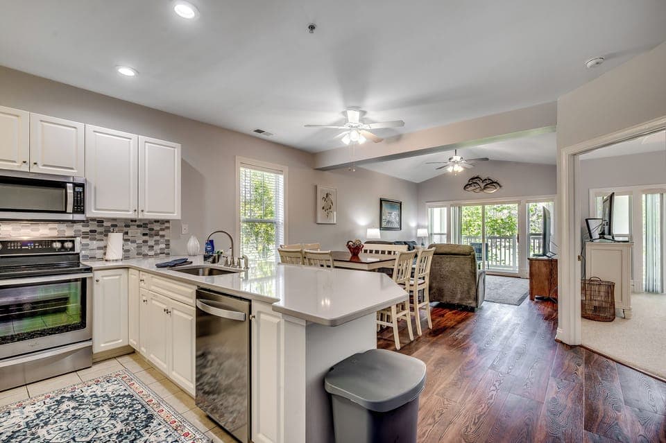 Open-concept kitchen, dining, and living space—perfect for gathering, relaxing, and making memories.