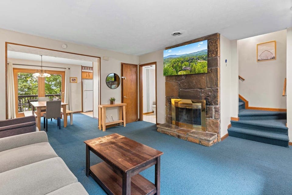 This inviting living room is designed for ultimate relaxation. It features a SmartTV for endless movie nights. 🚨 Fireplace is for decorative purposes only.