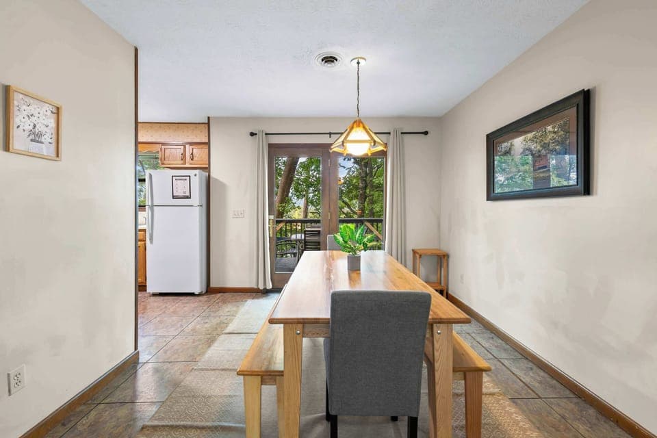 Our stunning open-concept kitchen and dining area is the ideal space for gathering, cooking, and making unforgettable memories together.
