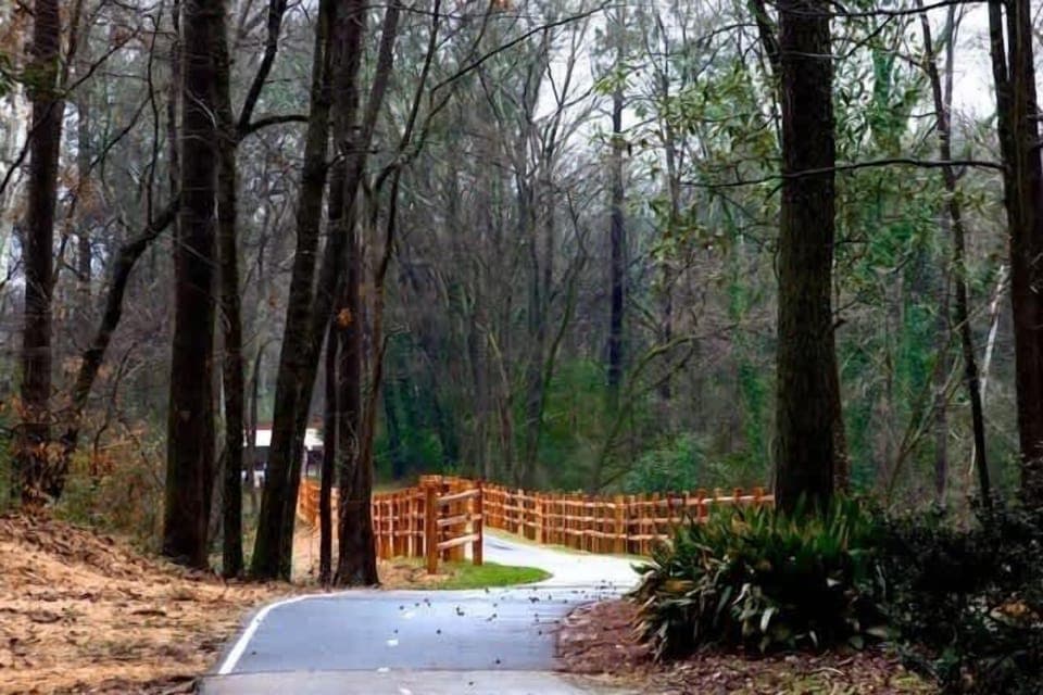 Explore the North Augusta Greenway, a peaceful path perfect for walking, biking, and enjoying the stunning natural beauty of the area.