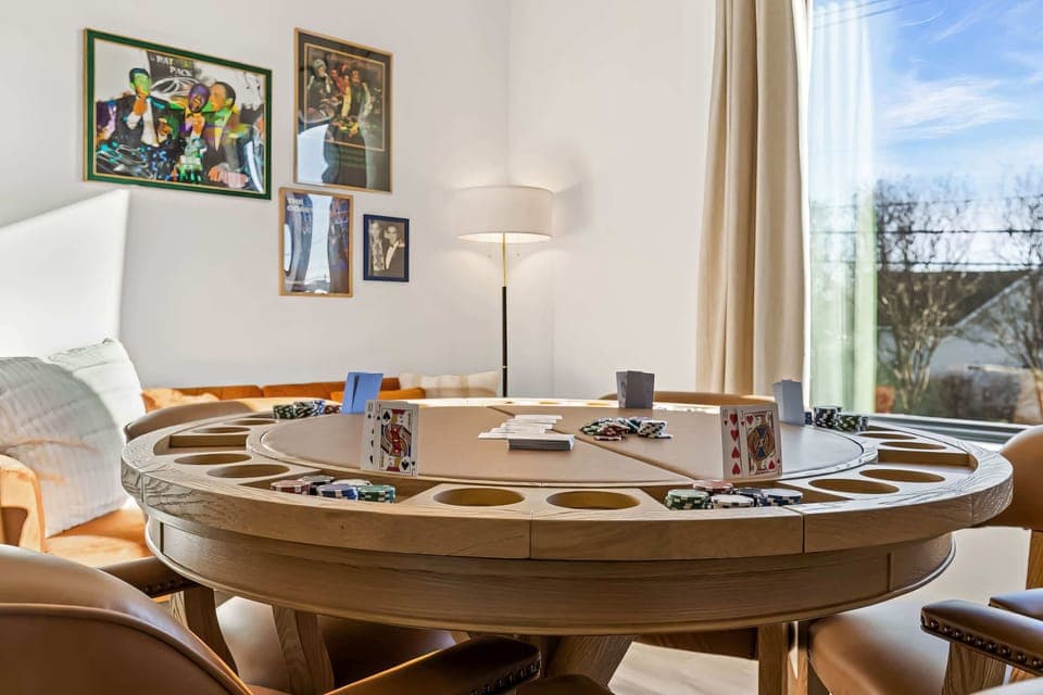 Gather friends for a fun night in this stylish game room—perfect for a Nashville bachelorette party or family reunion! Enjoy games and laughter in comfort while soaking up the vibrant Music City vibe. Your unforgettable getaway awaits!