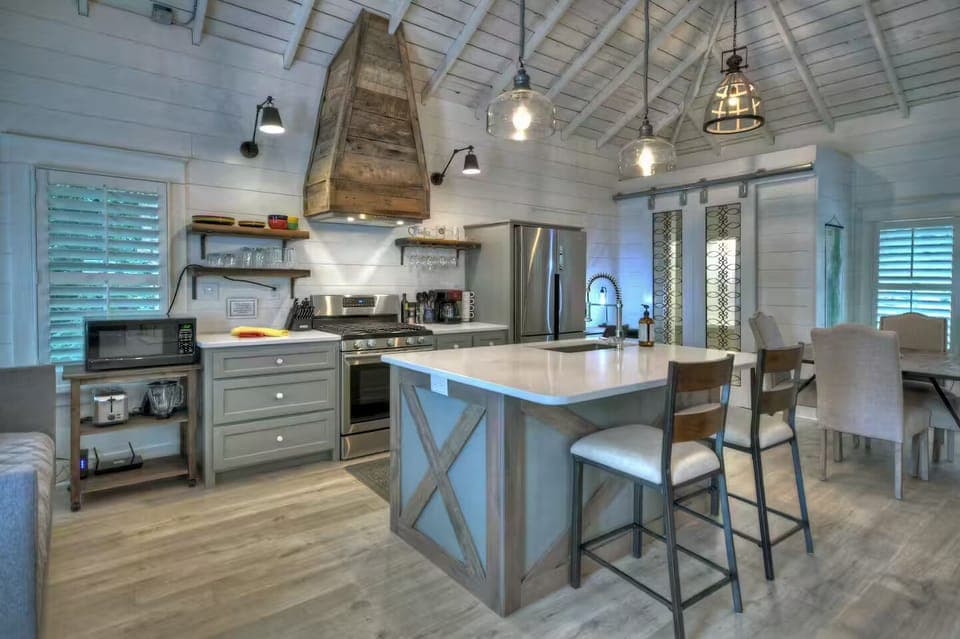 Pantry storage in corner behind sliding doors