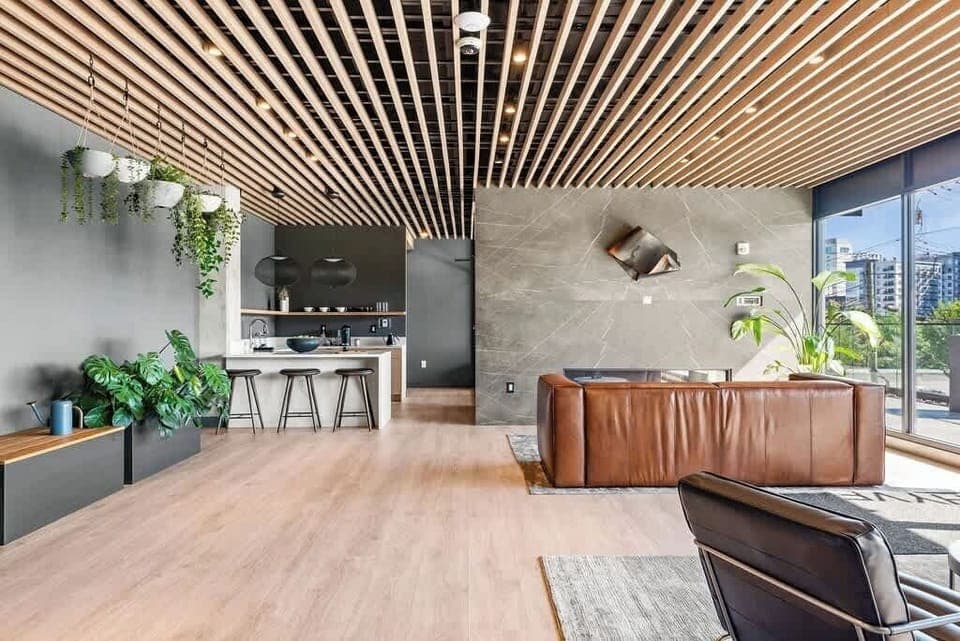 Lobby with real plants,  island seating and coffee station every morning except Tuesday and Wednesday