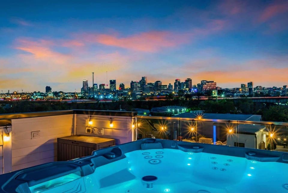 Relax on the rooftop deck with stunning Downtown Nashville skyline views. Enjoy a drink in the hot tub at sunset—an ideal setting for your Nashville vacation or bachelorette party. Experience Music City luxury like never before!