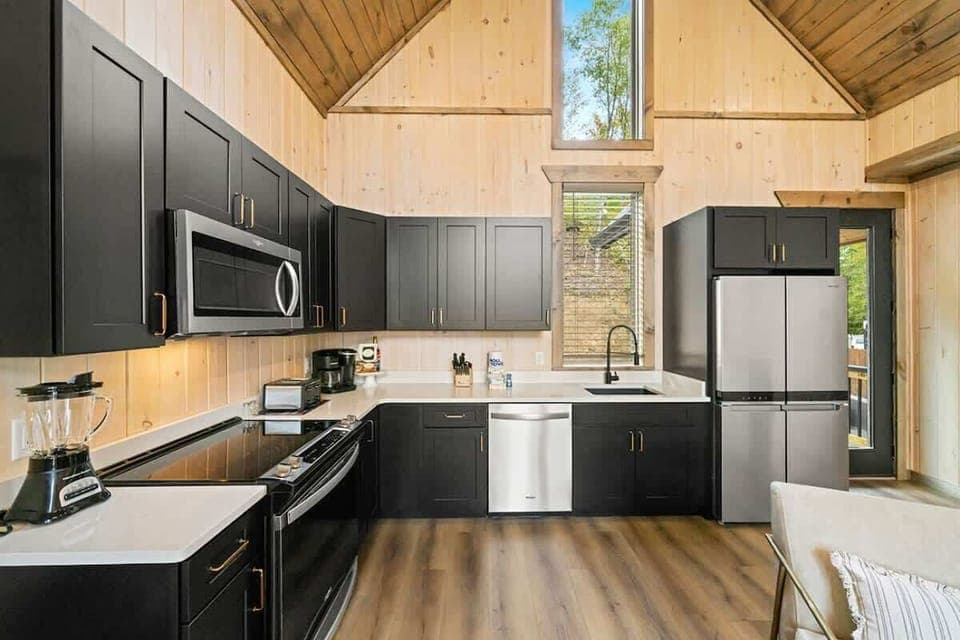 Fully stocked kitchen so you can cook and feed your group during your stay. (stove, oven, microwave, sink (no disposal), fridge, freezer, coffee machine, blender, can opener, toaster, cook/bakeware, silverware, dishes, cups, mugs, and wine glasses.