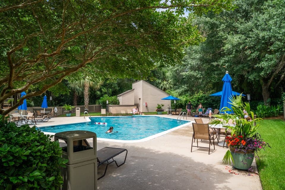 Soak up the sun by the sparkling community pool – just steps from your villa!