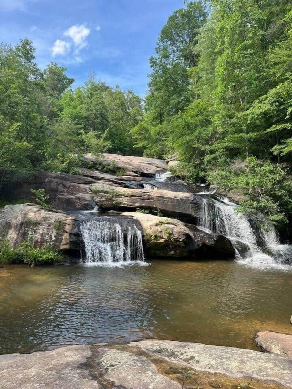 Chau Ram Park in Westminster, SC is a local favorite with a stunning waterfall, riverside trails, and smooth rock beaches perfect for wading or picnicking. A peaceful outdoor escape just a short drive from your stay!