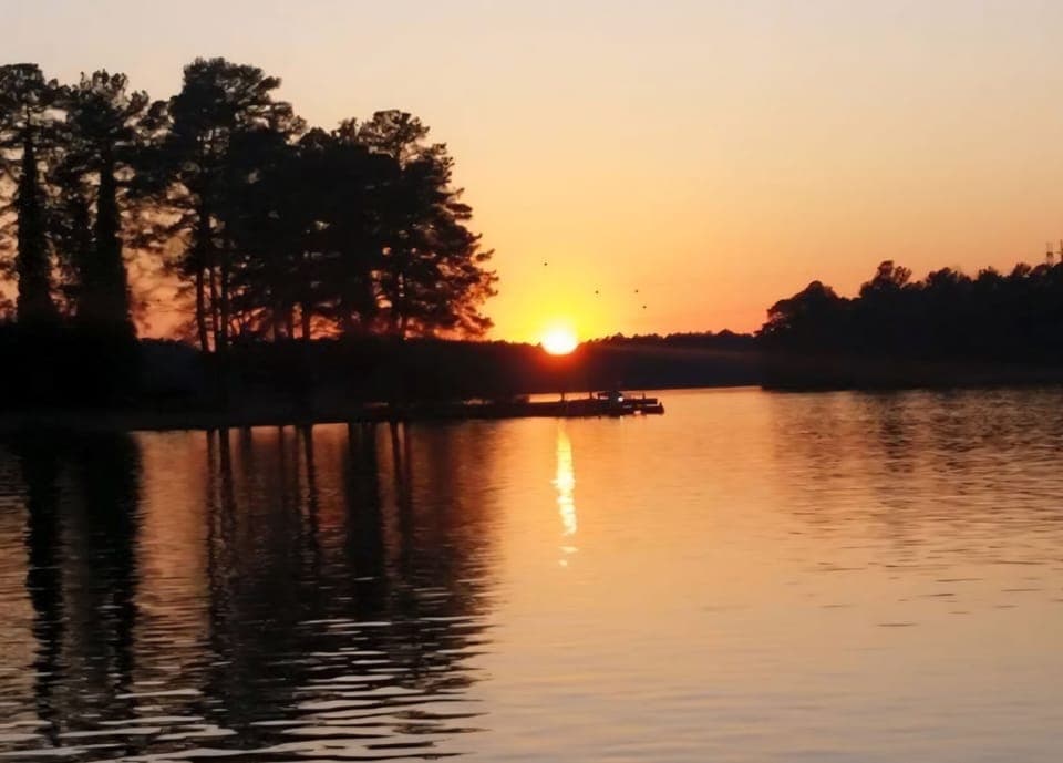 sunset from boat on main lake (view from dock is looking down cove)