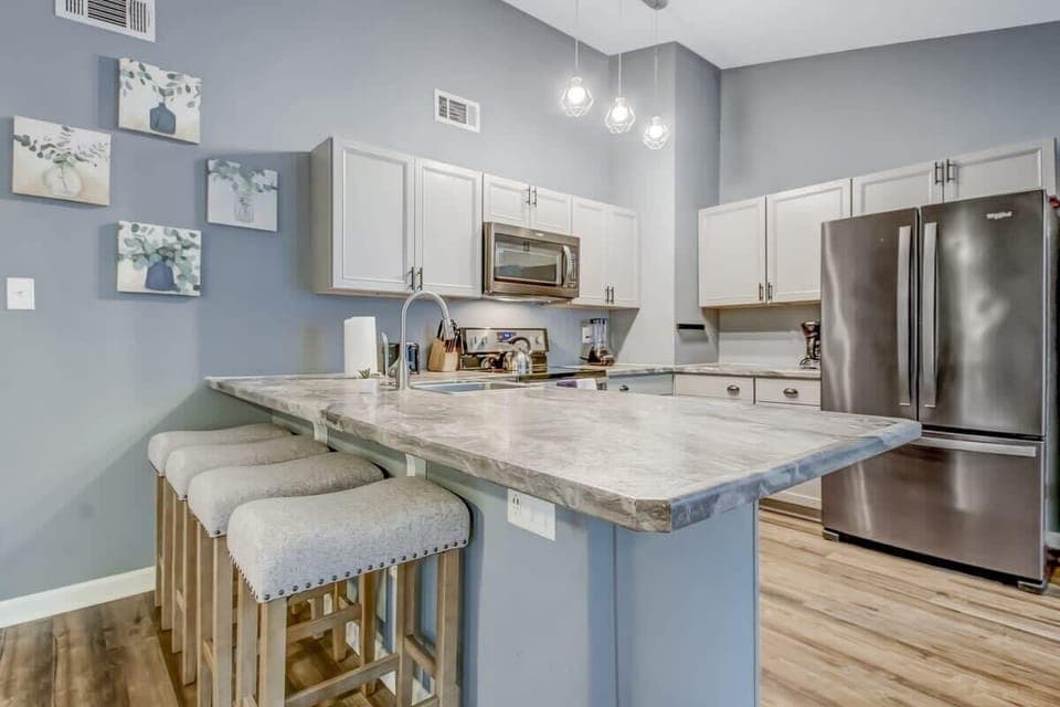 Breakfast bar seating allows you to enjoy meals and chat while cooking.