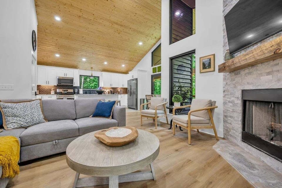 Open concept living area with stylish furnishings