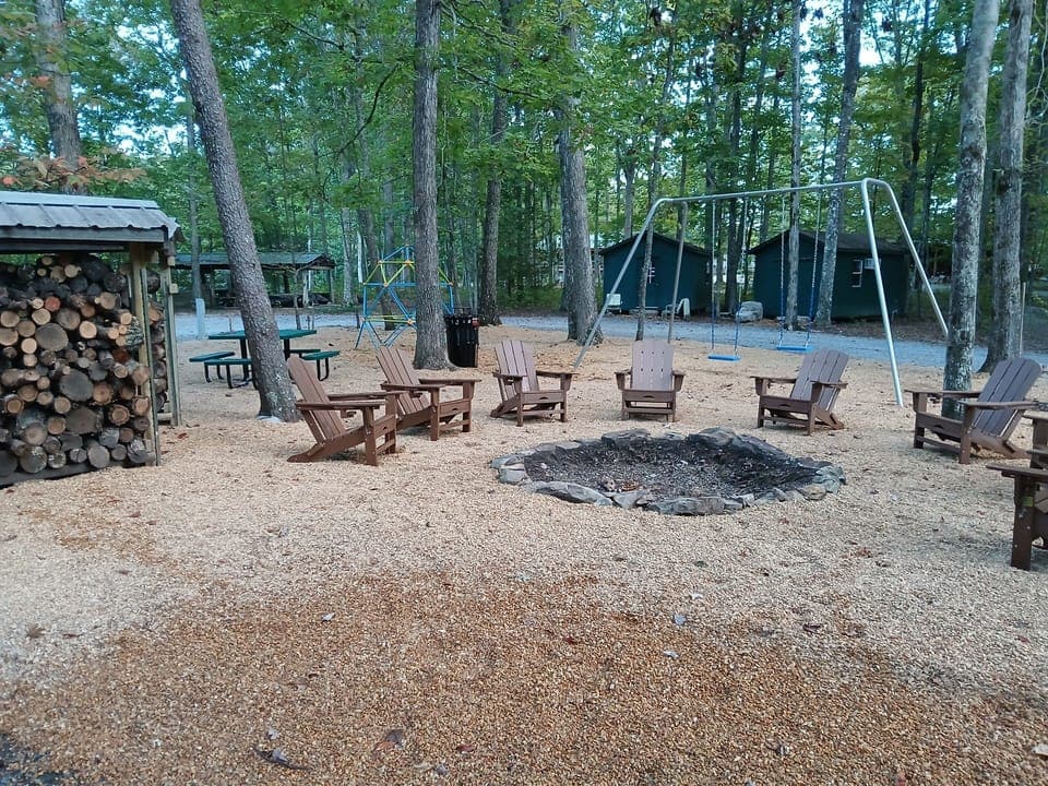 Campfires and play area next to the cabins. 