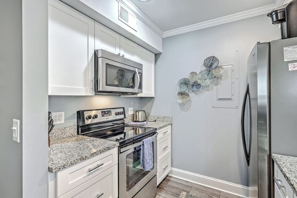 Well-stocked kitchen with ample cookware for all your culinary needs.