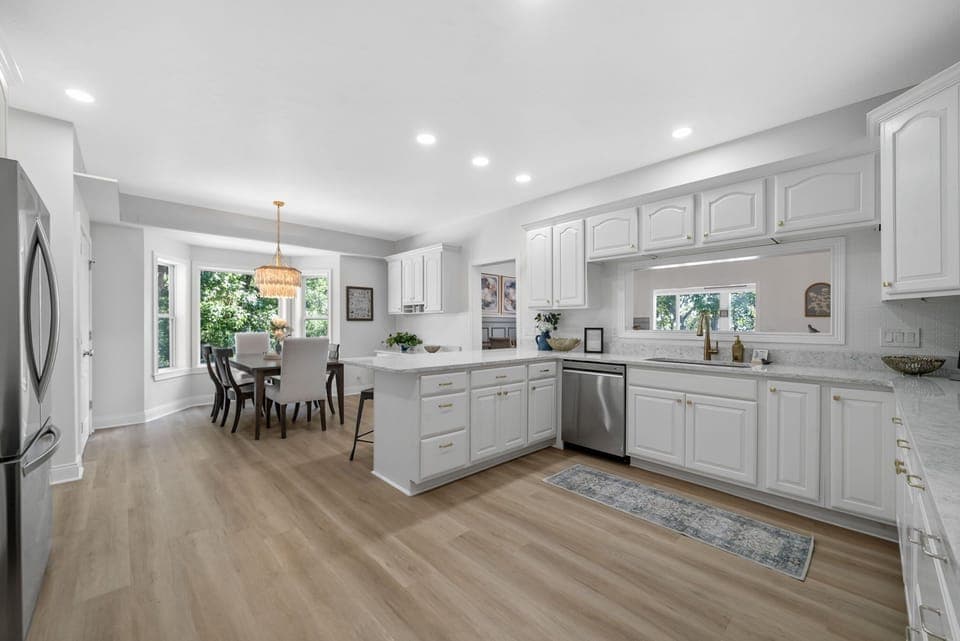 Modern kitchen with sleek finishes and generous breakfast bar.