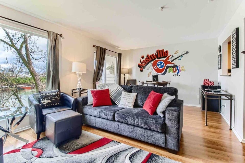 Spacious living room with queen sleeper sofa.