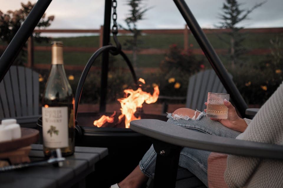 Gather around the private outdoor firepit with a glass of wine or toasted s'mores while enjoying sweeping mountain views—perfect for relaxing nights under the stars.