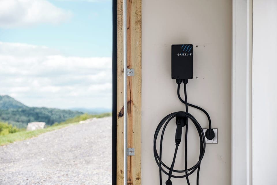 Convenient Level 2 EV charger available in the garage for guests driving electric vehicles. Charge up while you relax and enjoy your stay.