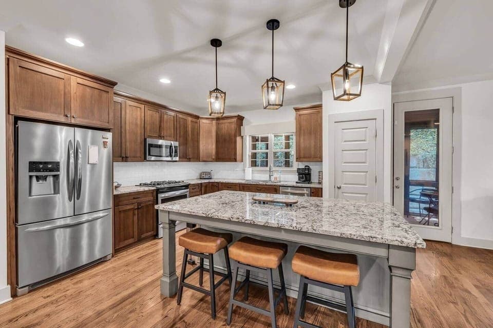 Plan on staying in for the night?  Grab some groceries at the Publix 5 minutes away and enjoy cooking in this well appointed spacious kitchen while conversing with friends and family in the connected living spaces.