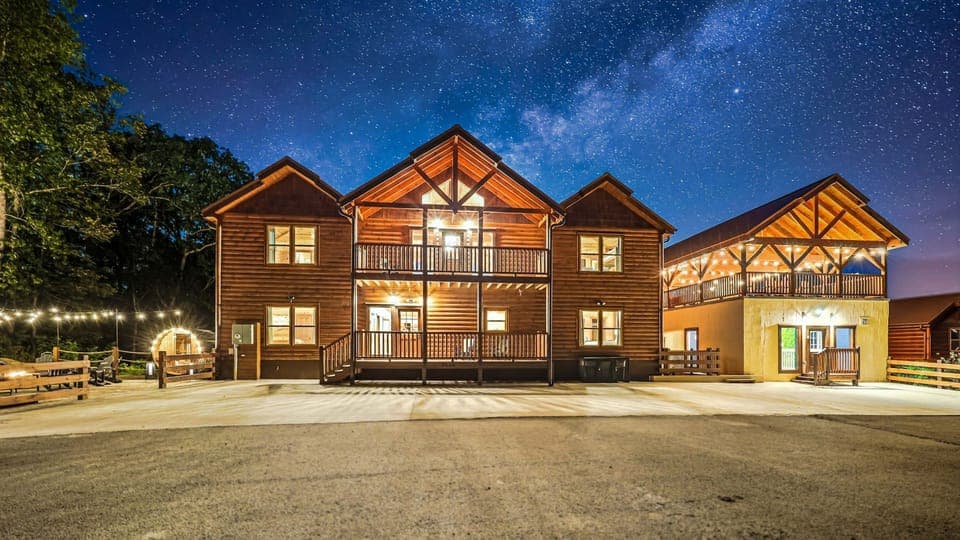 Game Time Retreat is a large, luxurious 8 bedroom cabin that is 5,800 square feet and has a Waterfall, large Patio, Firepit, an EPIC Game Room, Indoor Pool, Outdoor Theater, Spa, Outdoor Sauna and More!