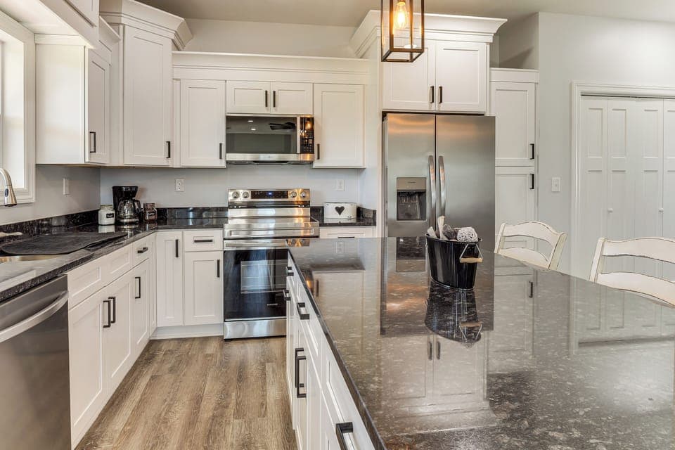 Kitchen | 1st Floor | Breakfast Bar | Dishware/Flatware