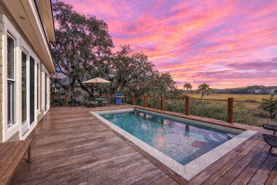 Sunset dips on the waterfront. Private pool bliss.