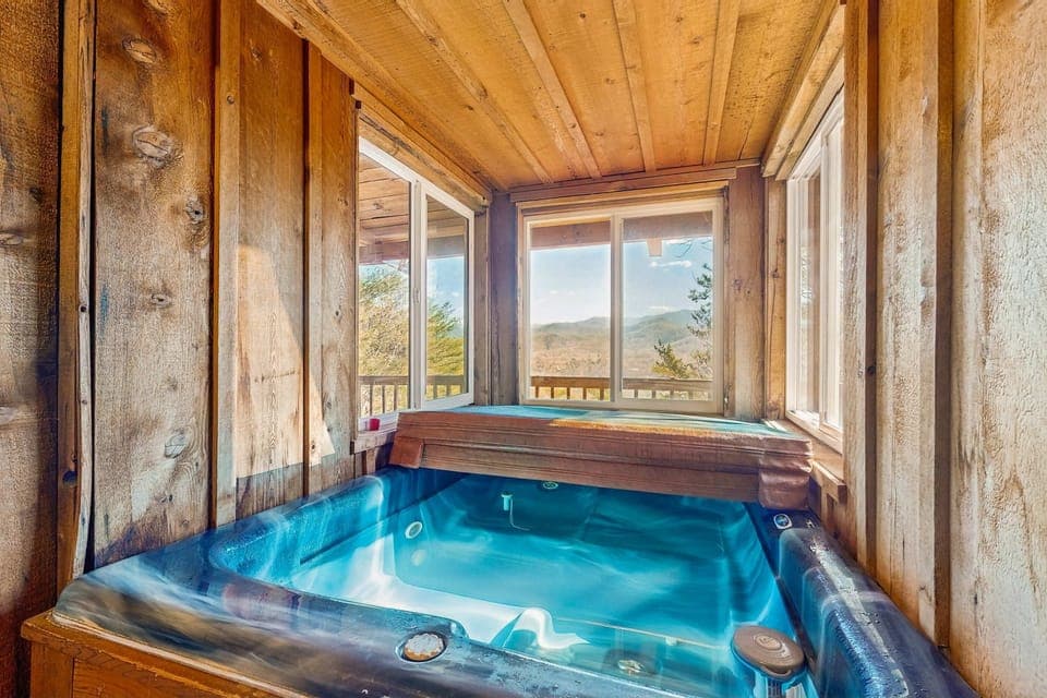 Spa retreat awaits. And, unwind in your private hot tub with breathtaking mountain views! Perfect relaxation awaits!